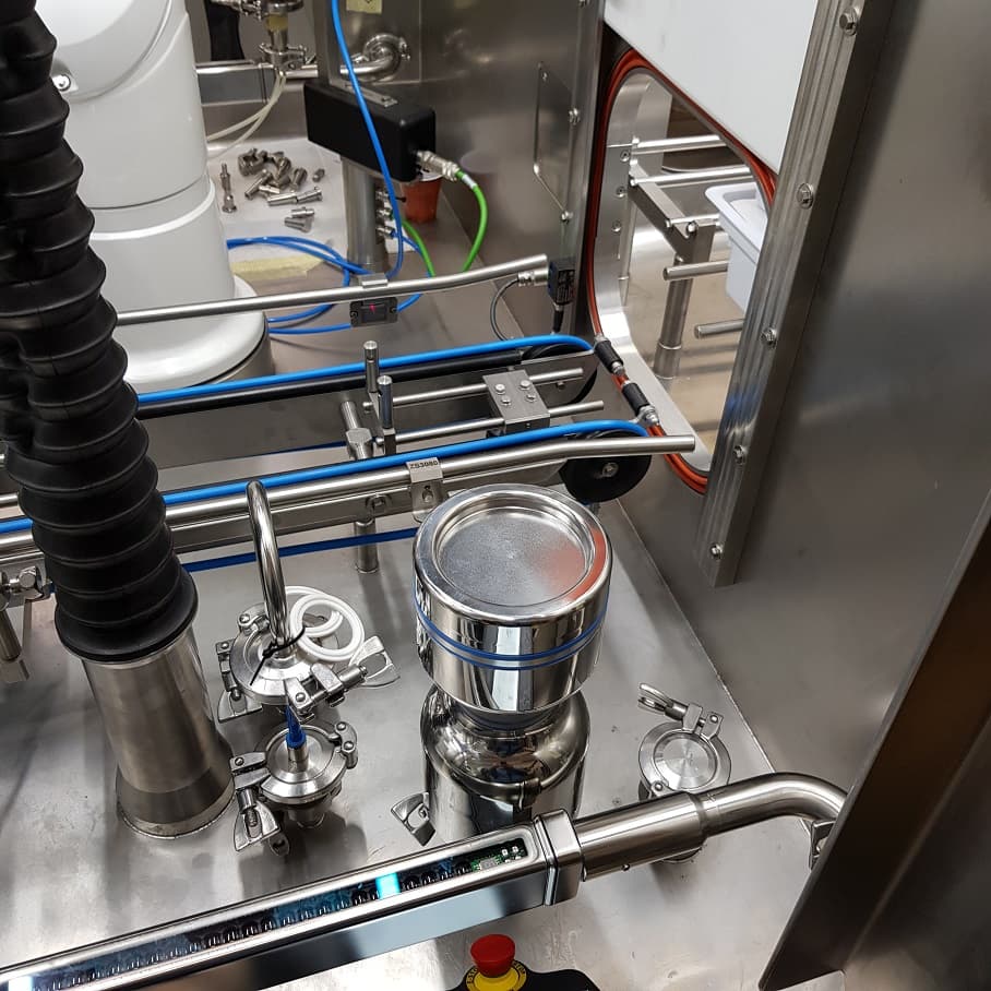 FS100 med diskhuvud monterat i isolator för automatisk rengöring